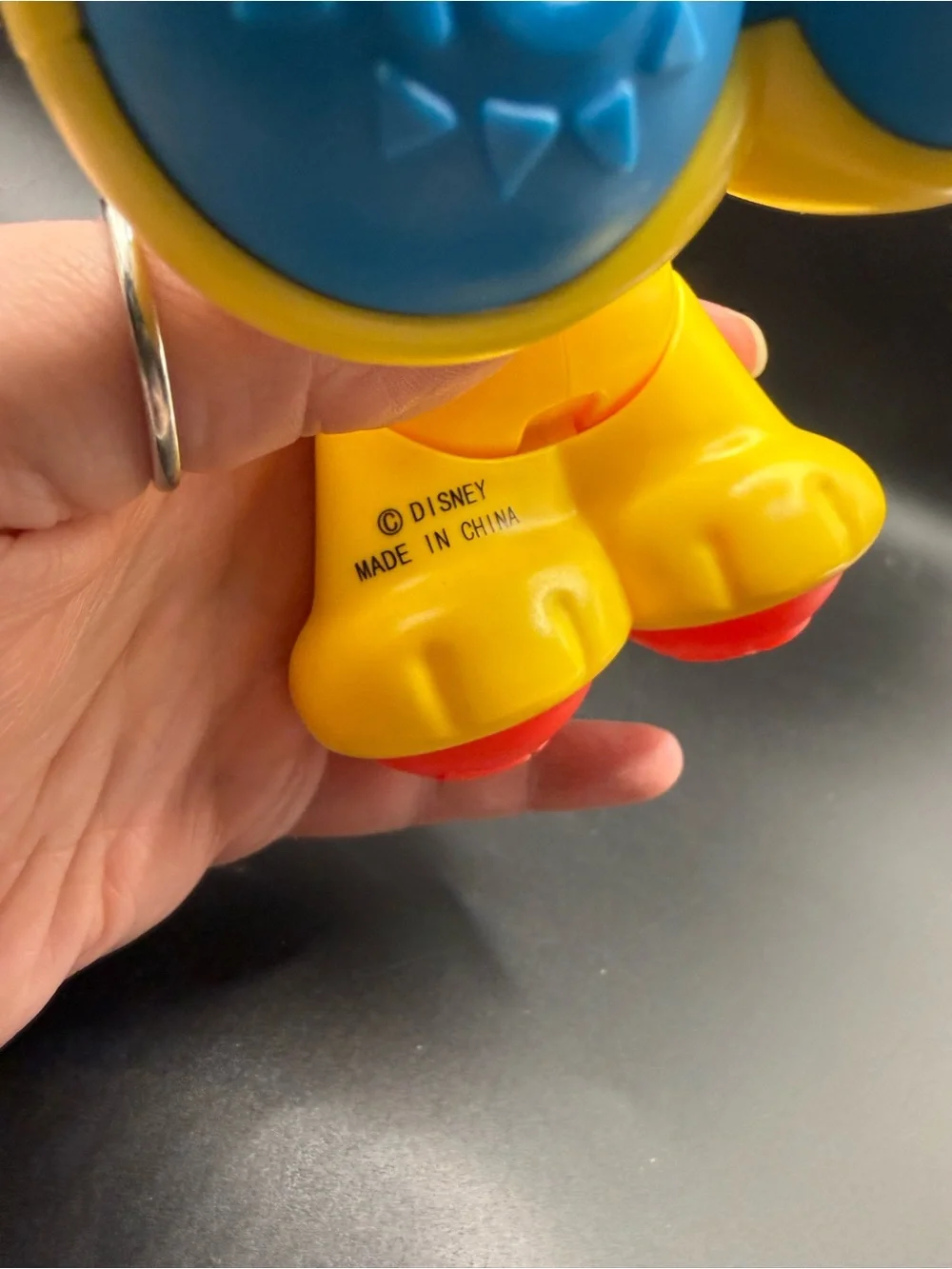 Fisher-Price Bright Yellow Lion Push Toy with Blue Wheels